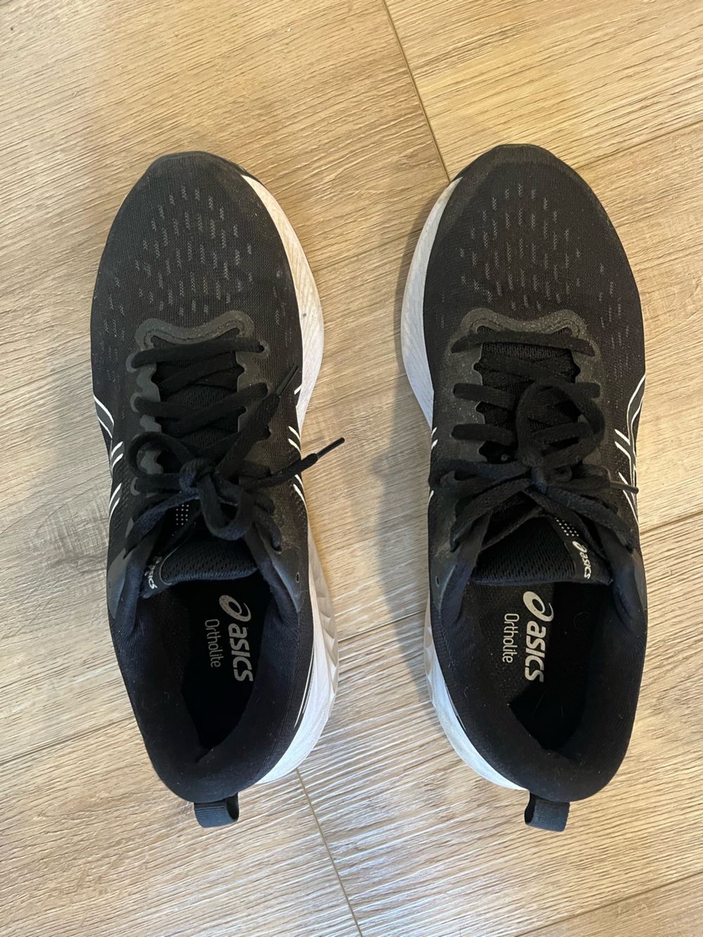 ASICS women’s Black and White Athletic Running Shoes